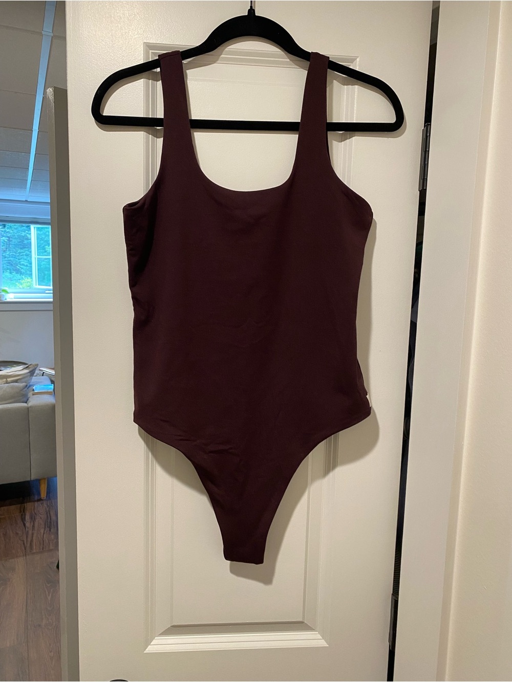 Vuori One-Piece bodysuit in Raisin
